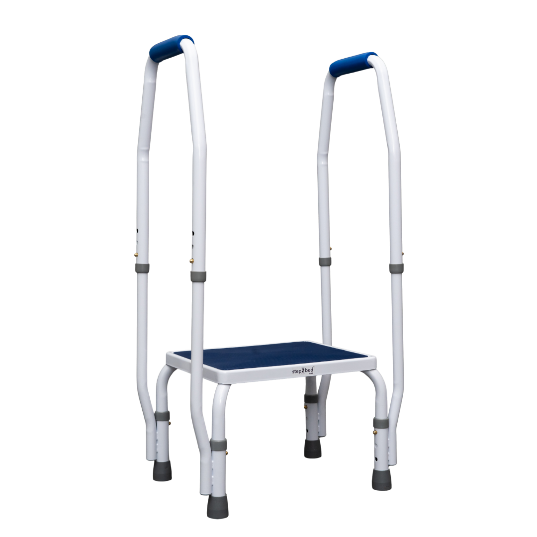 The Step2Bed Mini Bedside Stepper is a white step stool featuring four sturdy legs, a non-slip blue platform, and two tall handles with blue grips for added support—ideal for stability and fall prevention.